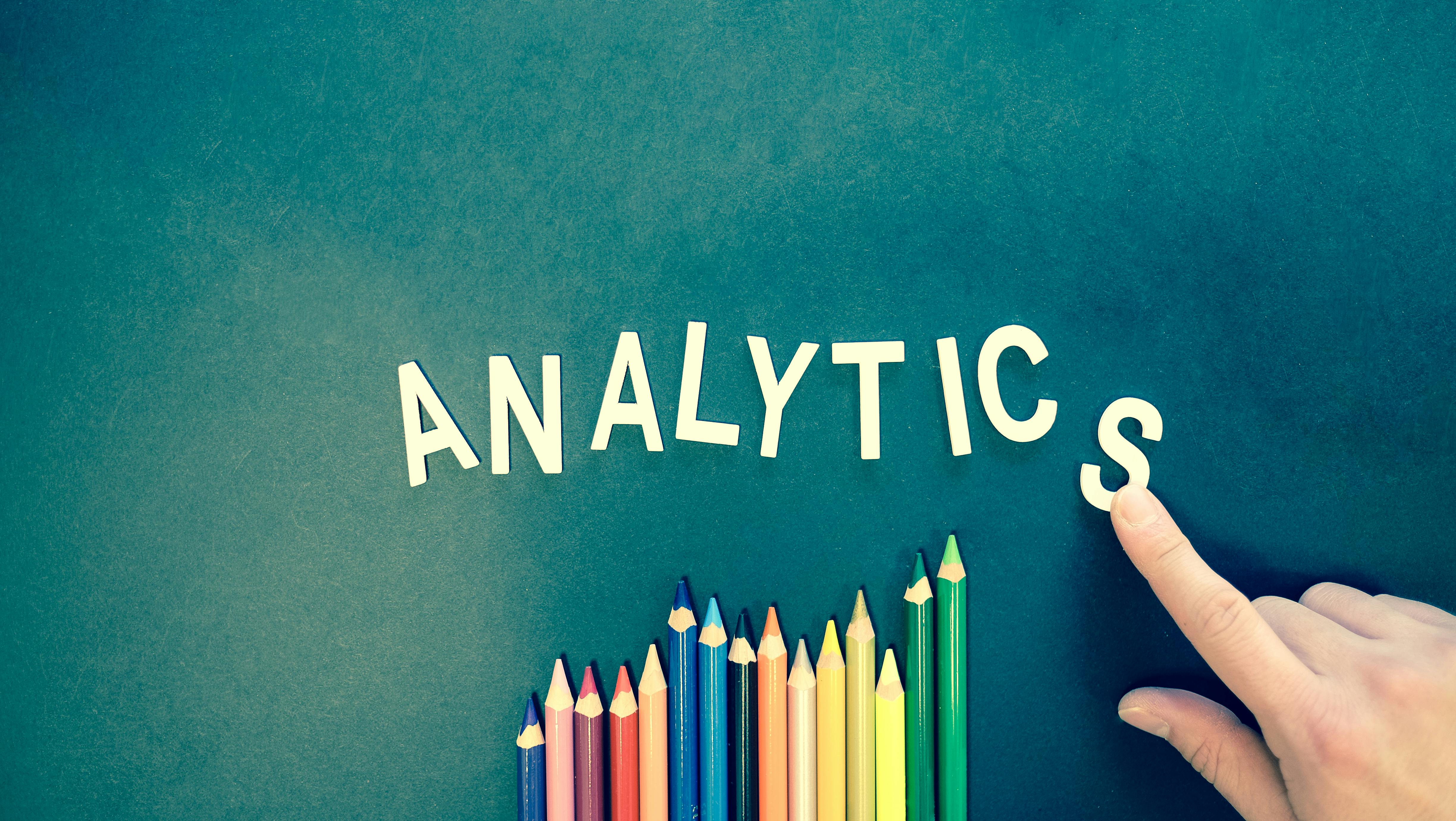 An image showing the word "Analytics" written out with a person pointing to it.<br>